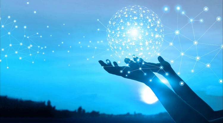 Hands holding a globe made of connected profile silhouettes with the Unite MM logo over the globe.