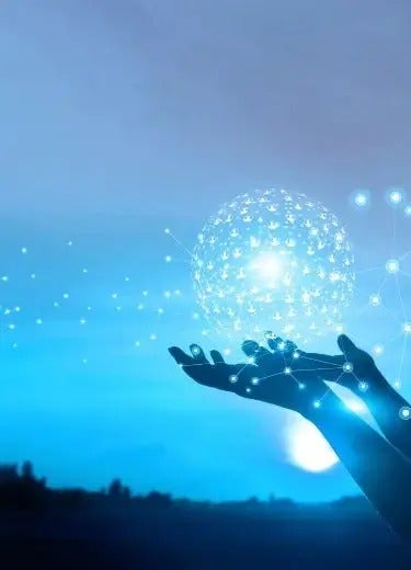 Hands holding a globe made of connected profile silhouettes with the Unite MM logo over the globe.
