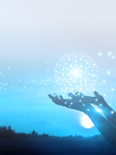 Hands holding a globe made of connected profile silhouettes with the Unite MM logo over the globe.