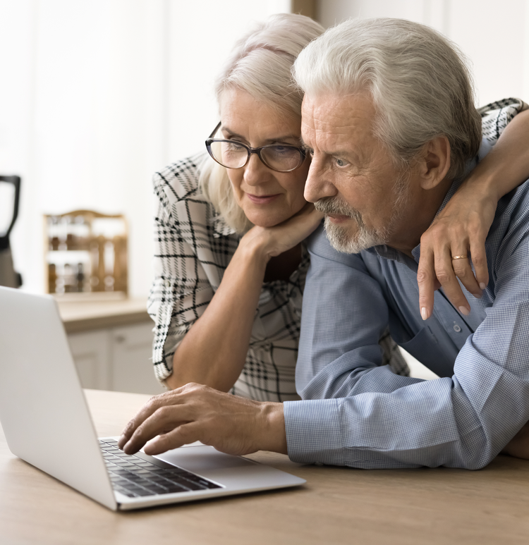 Male and Femal patients looking at a computer.