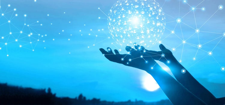 Hands holding a globe made of connected profile silhouettes with the Unite MM logo over the globe.